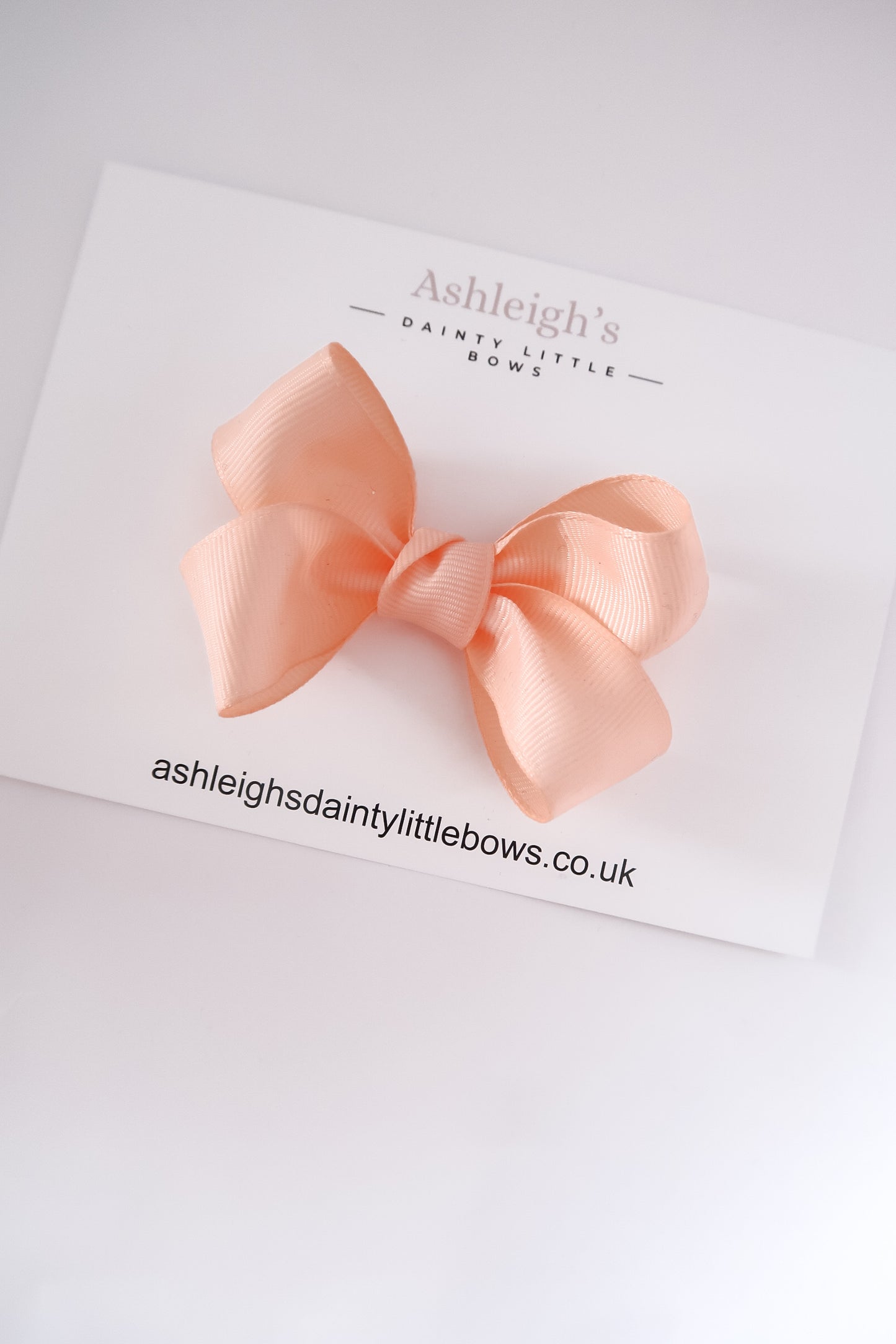 Peach boutique bow