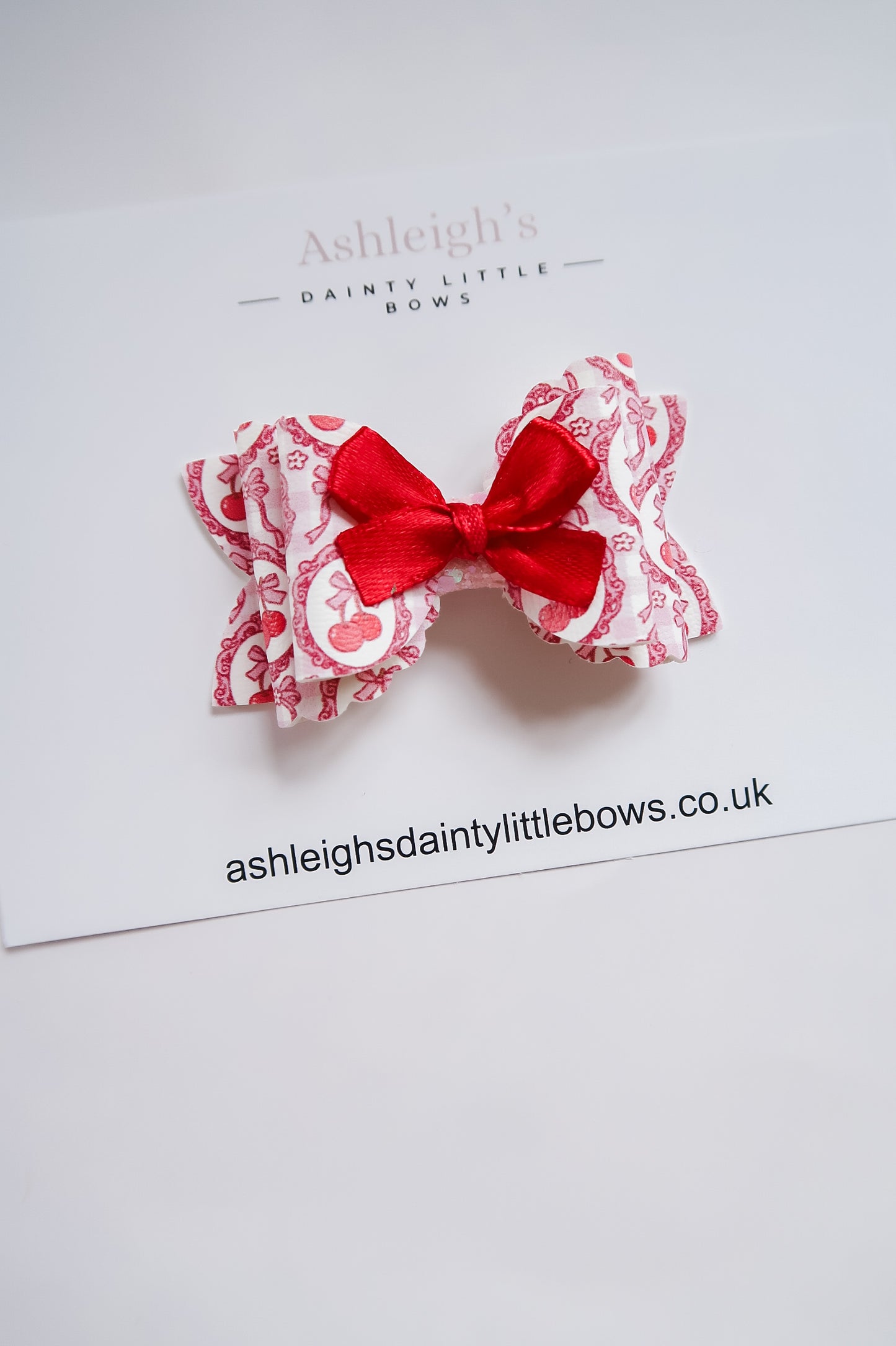 Cherry scalloped bow