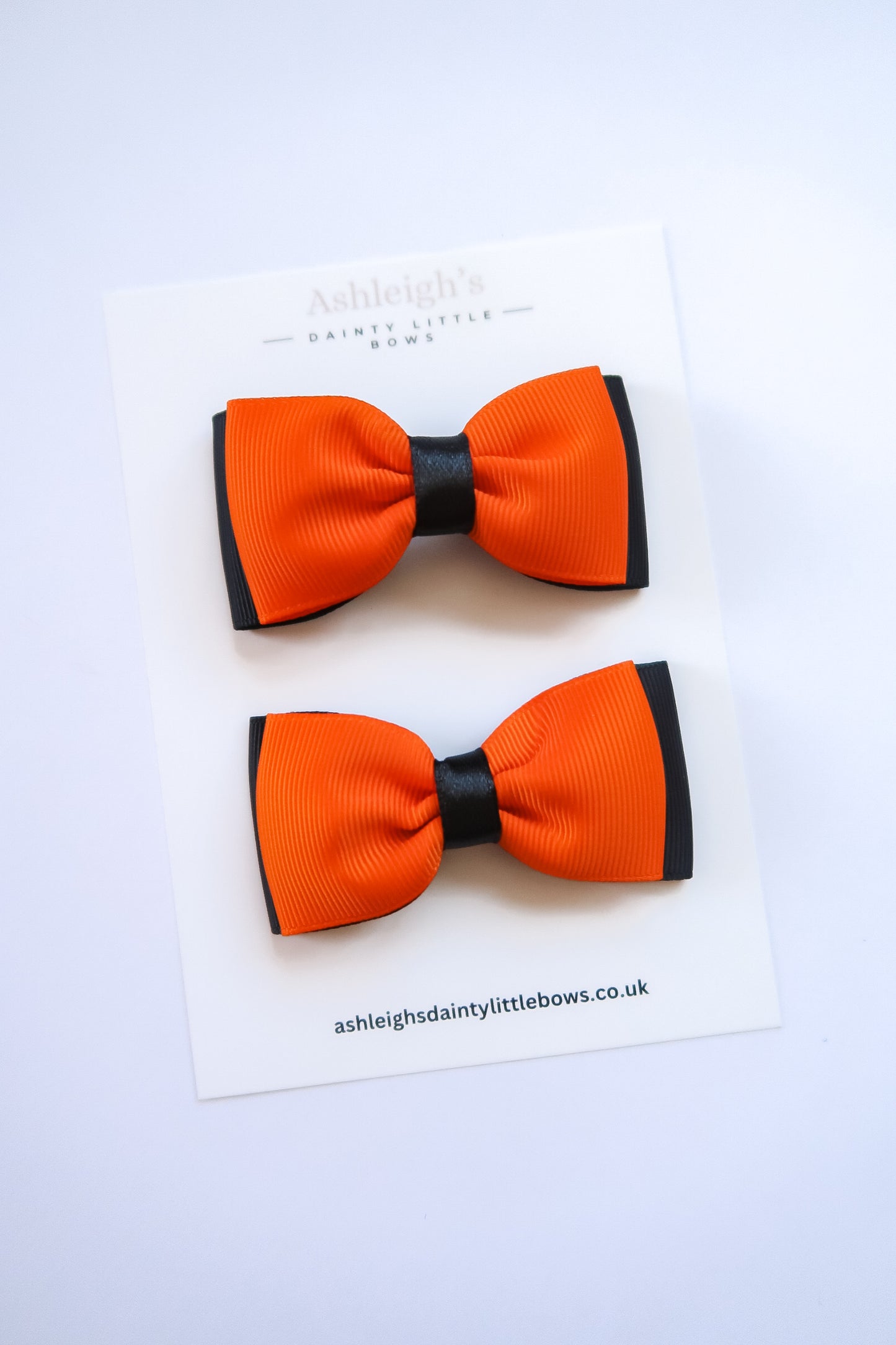 Orange pinch bow