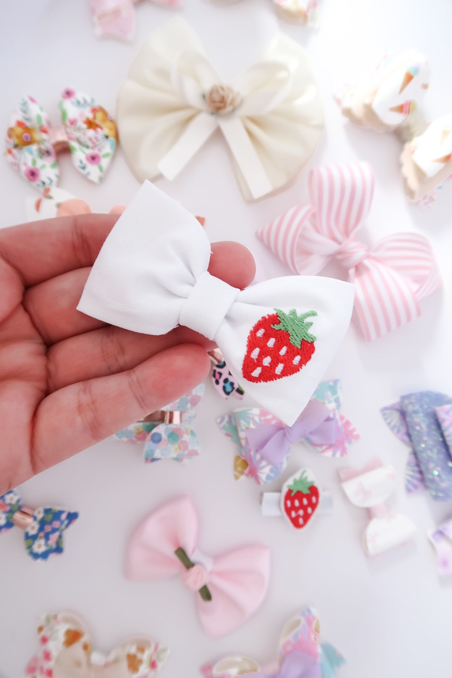 Embroidered strawberry bow