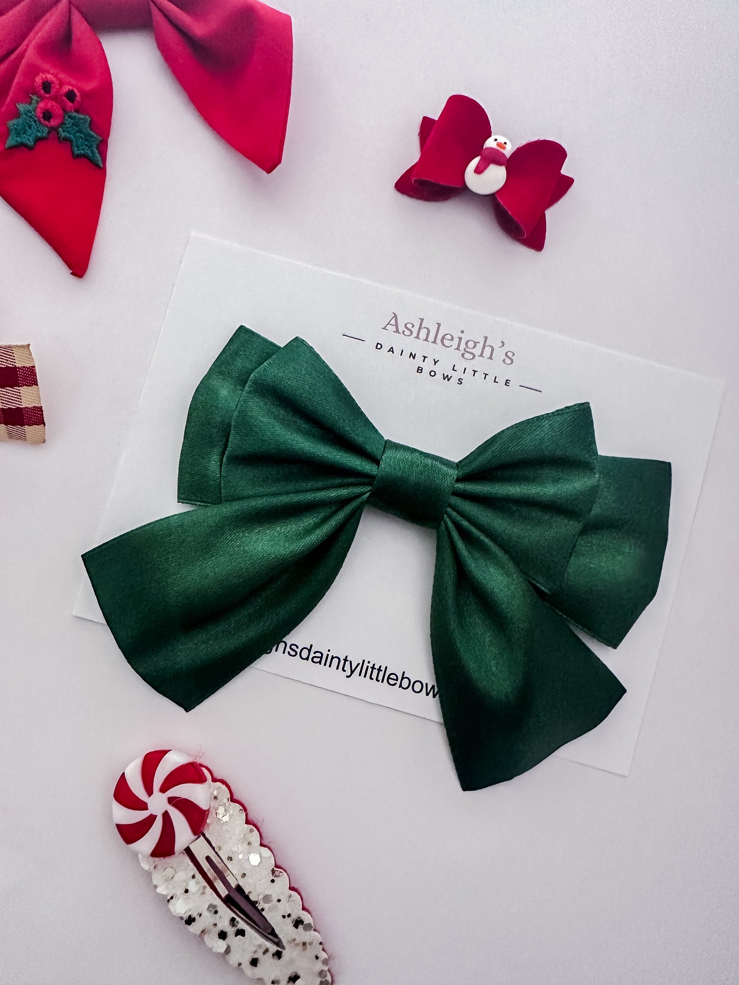 Large emerald green bow