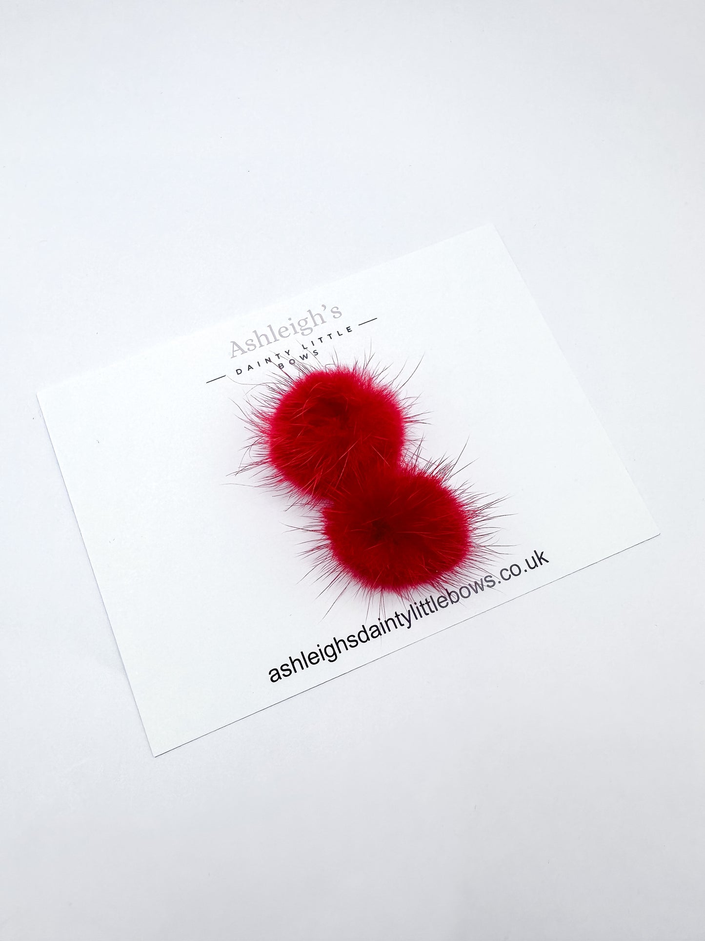 Red pom pom