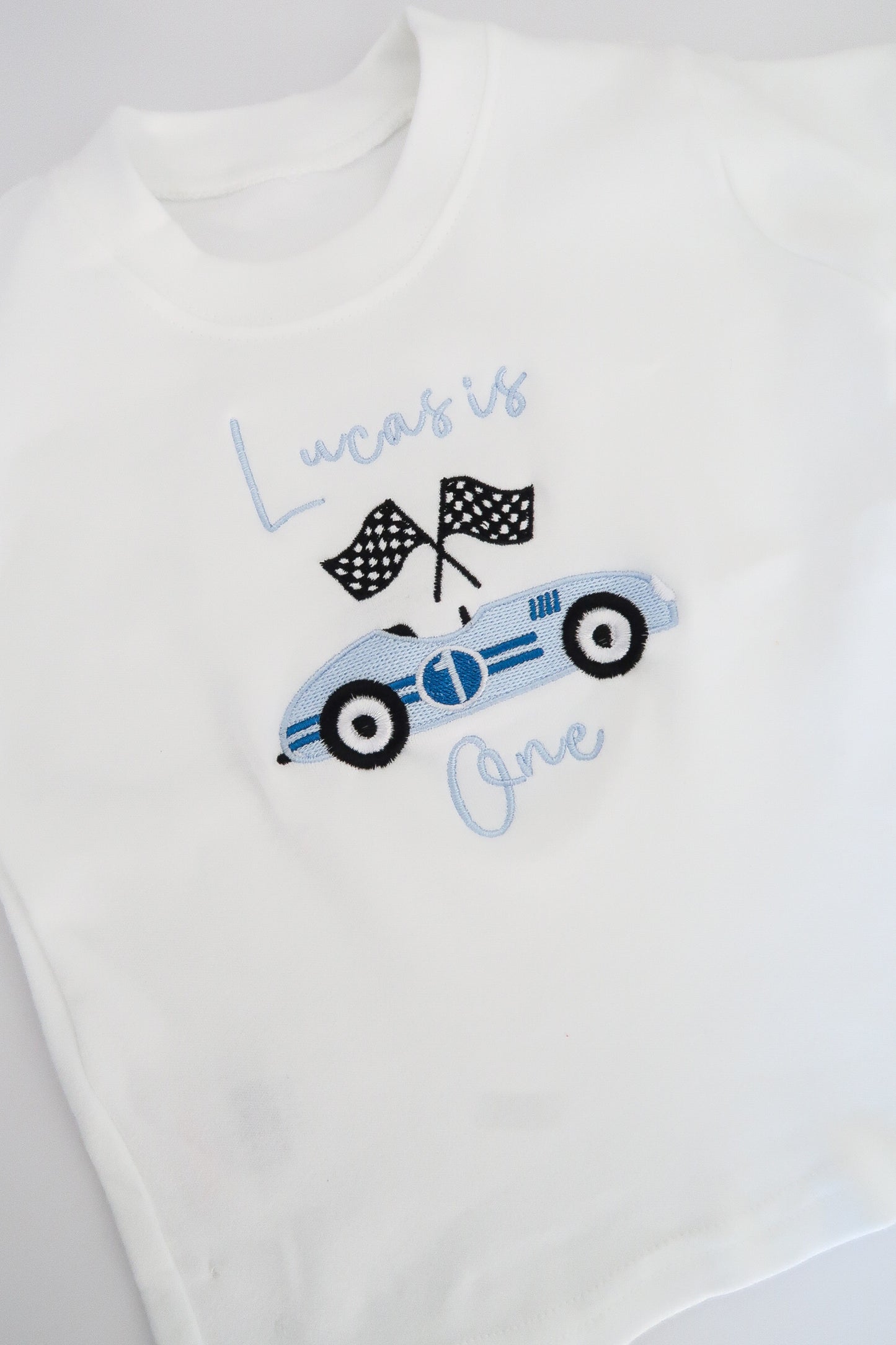 Boys racing birthday top