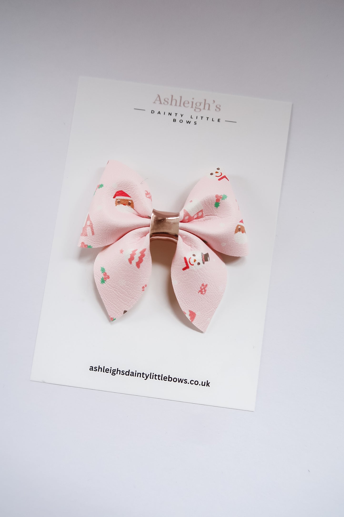 Pinkmas pinch bow