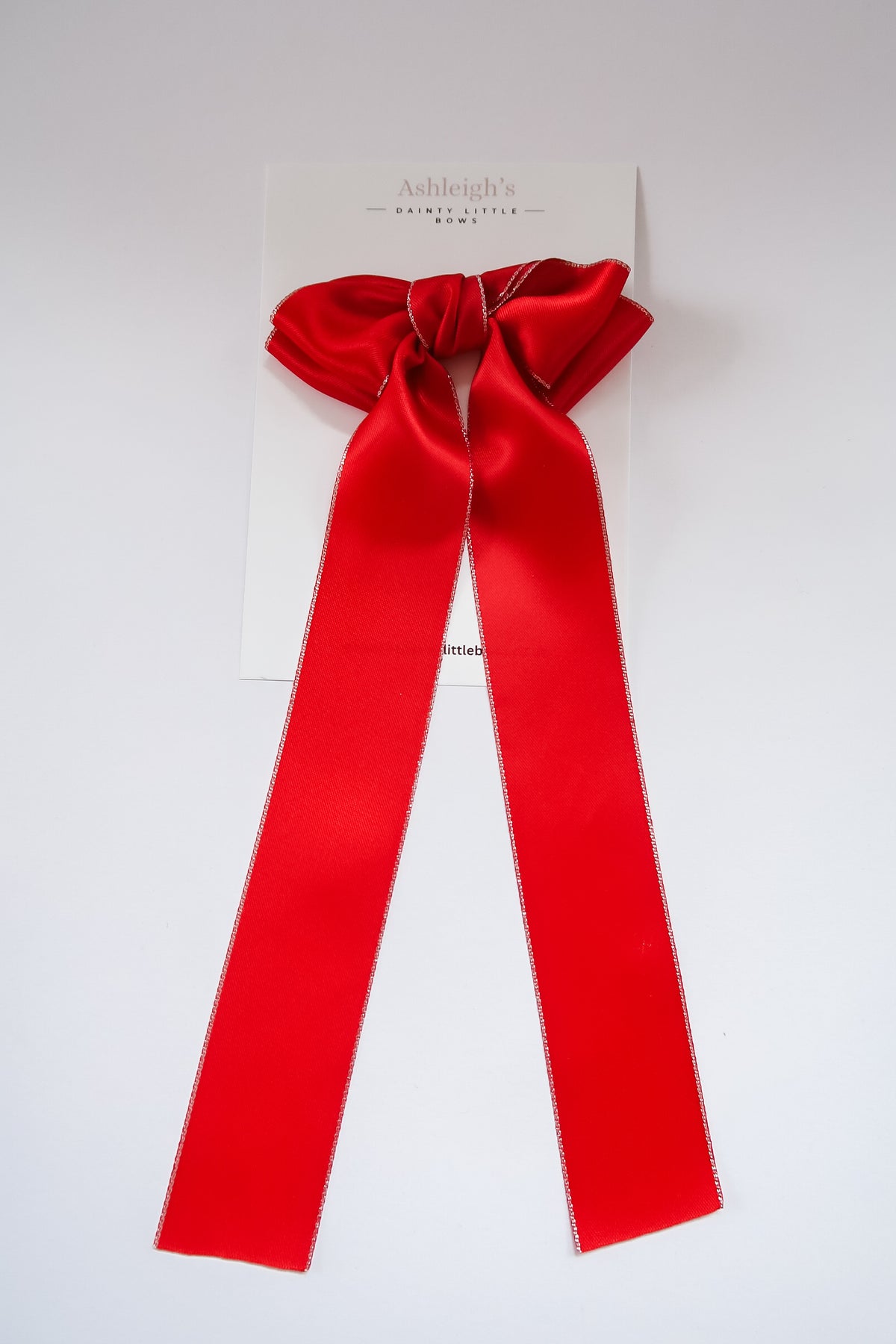 Long tail miss bow red