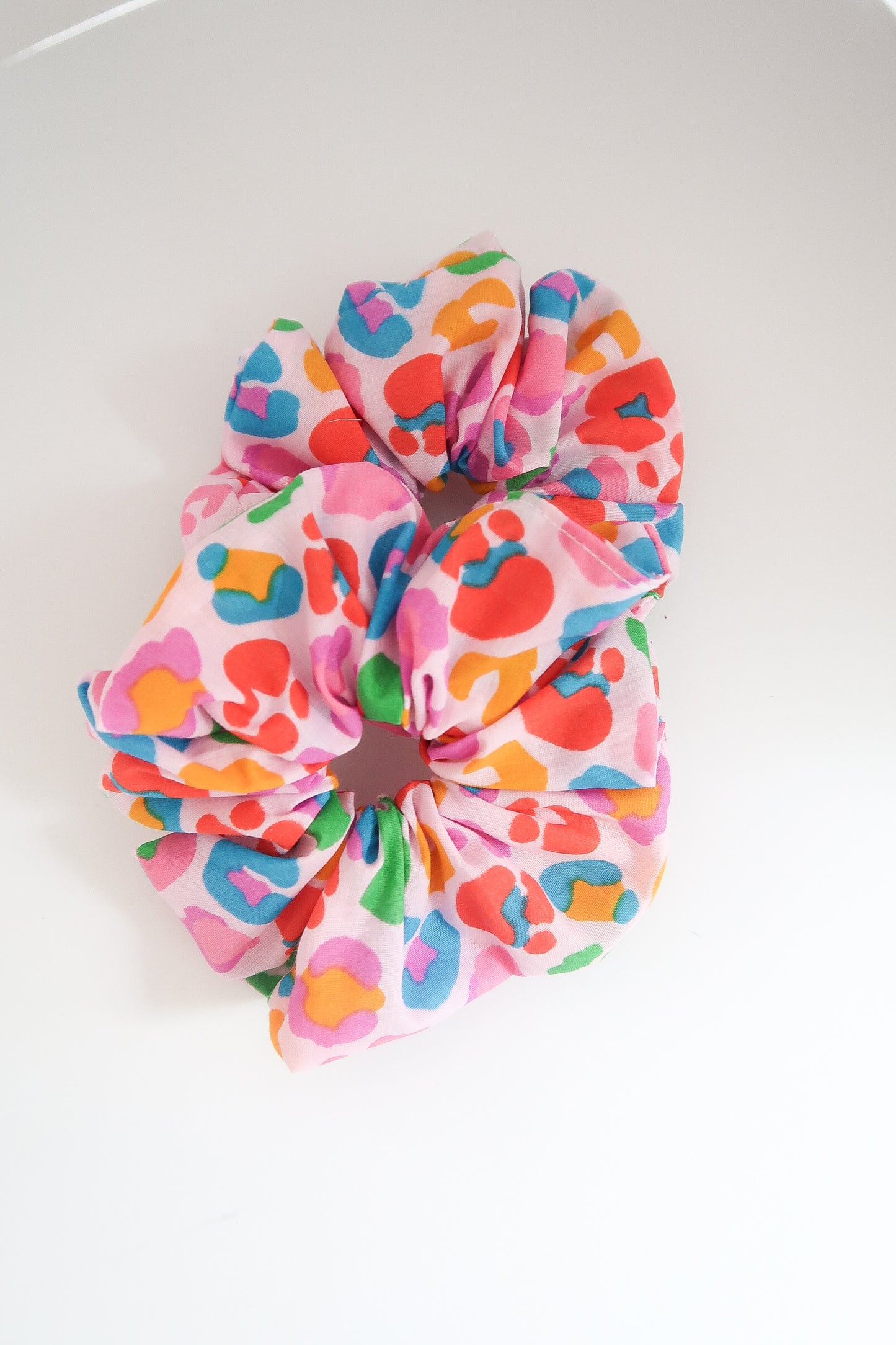 Rainbow leopard scrunchie