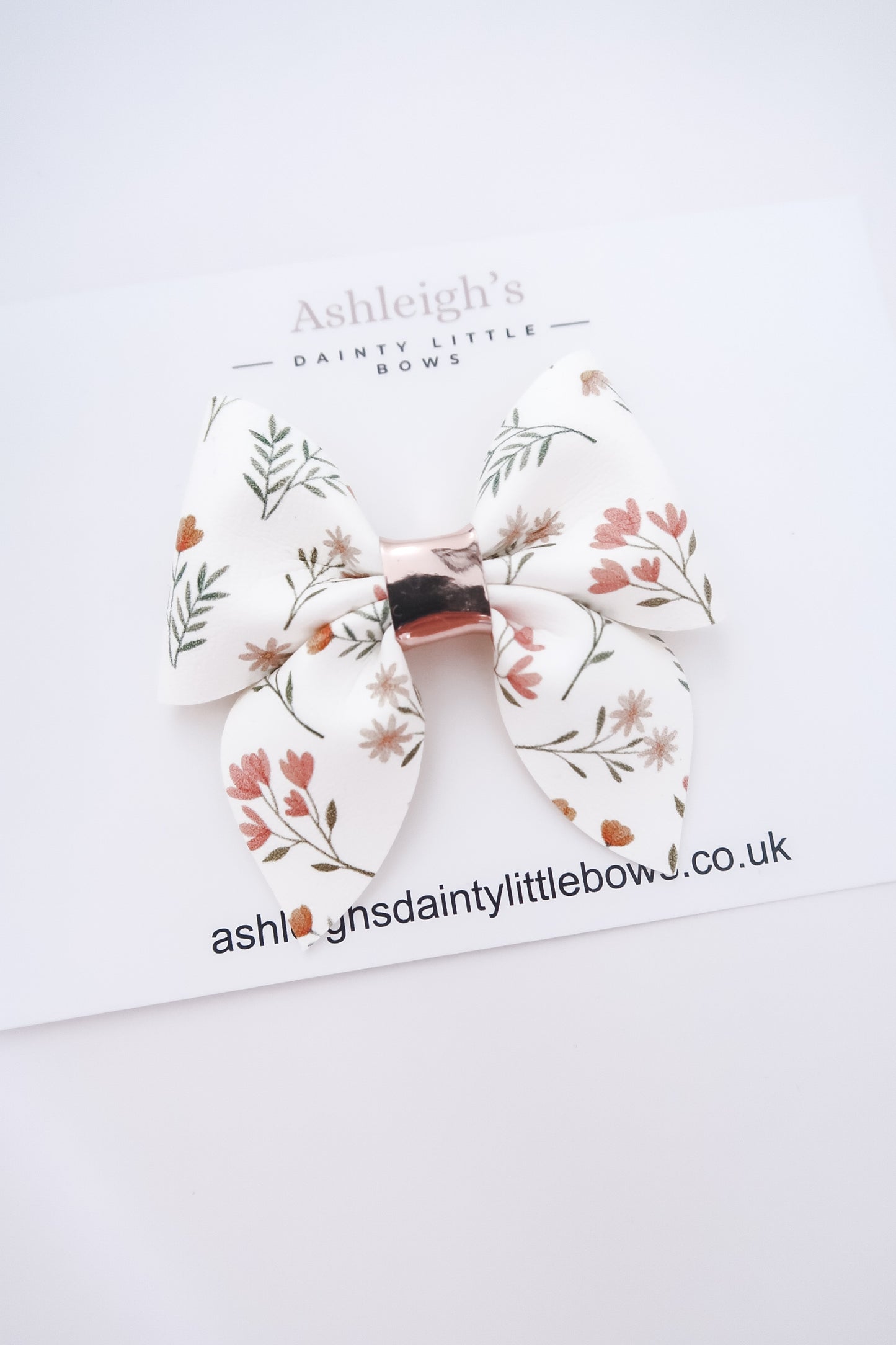 Dainty floral pinch bow