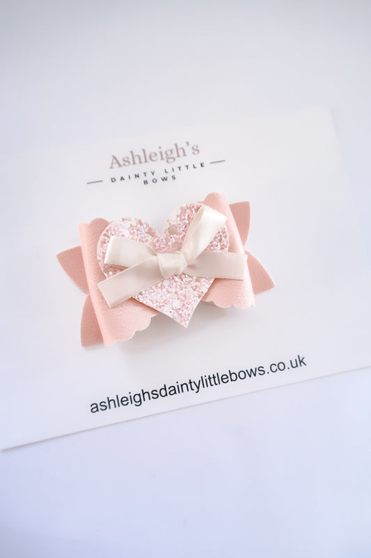 Blush heart bow