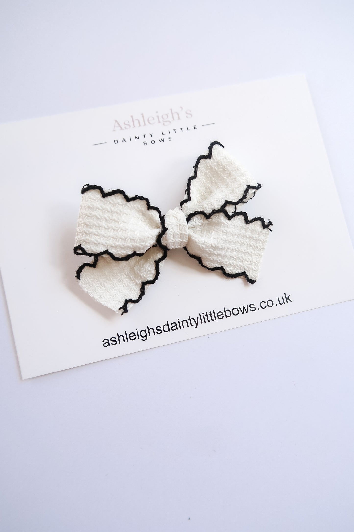 White black trim tied bow