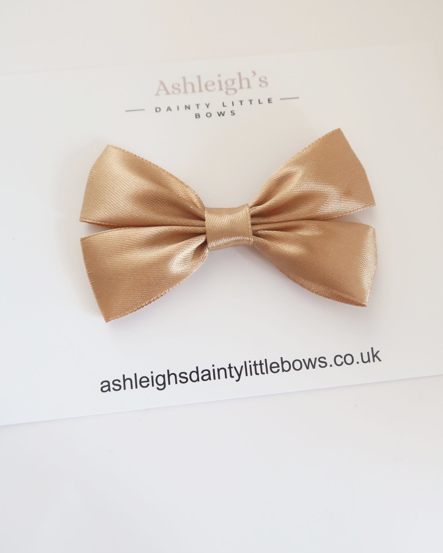 Beige satin pinch bow