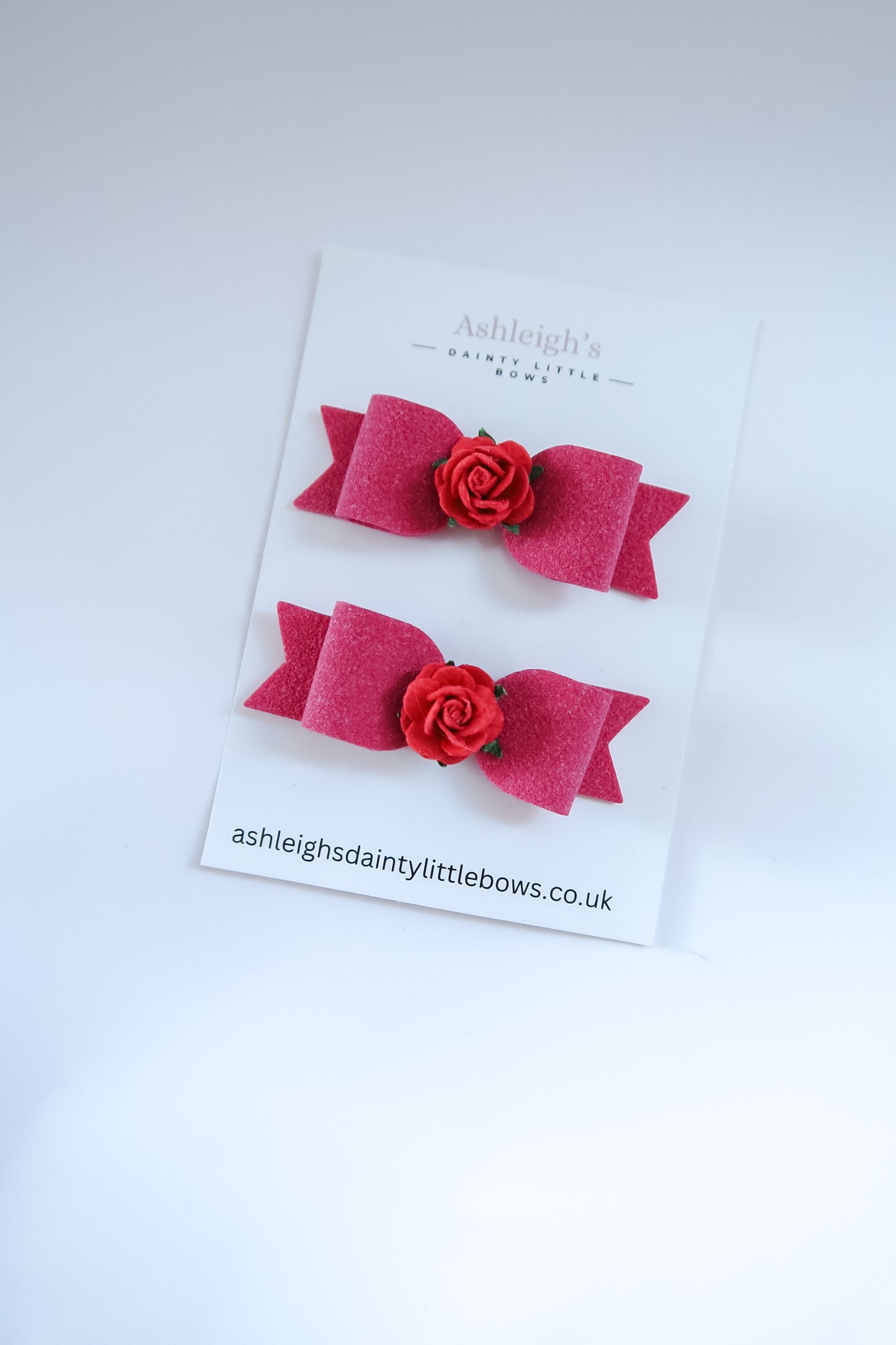 Suede rose tux bow