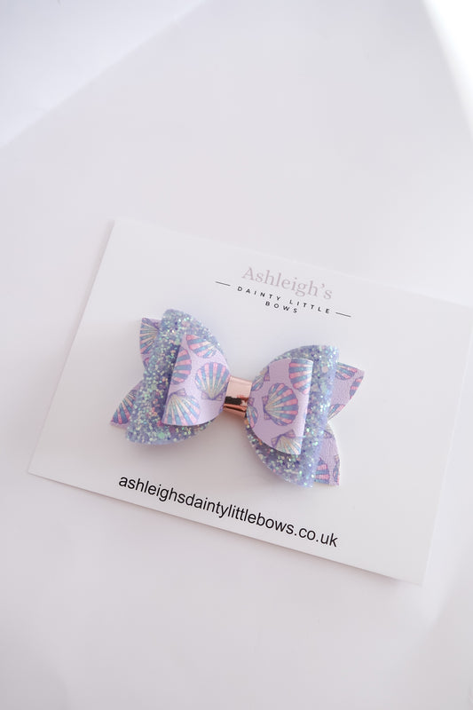 Dollie seashell bow