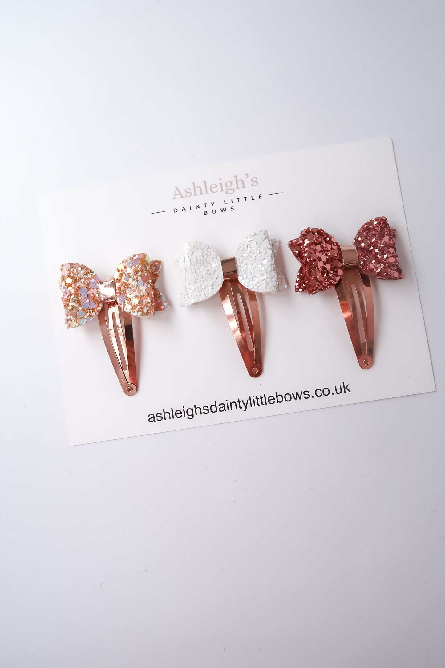 Rose gold bow snap clip