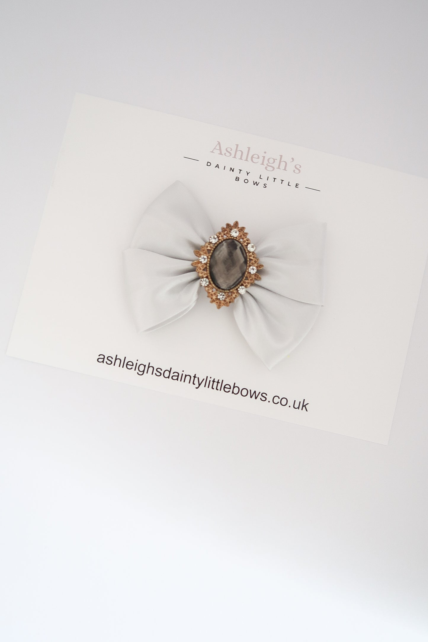 Grey gem bow