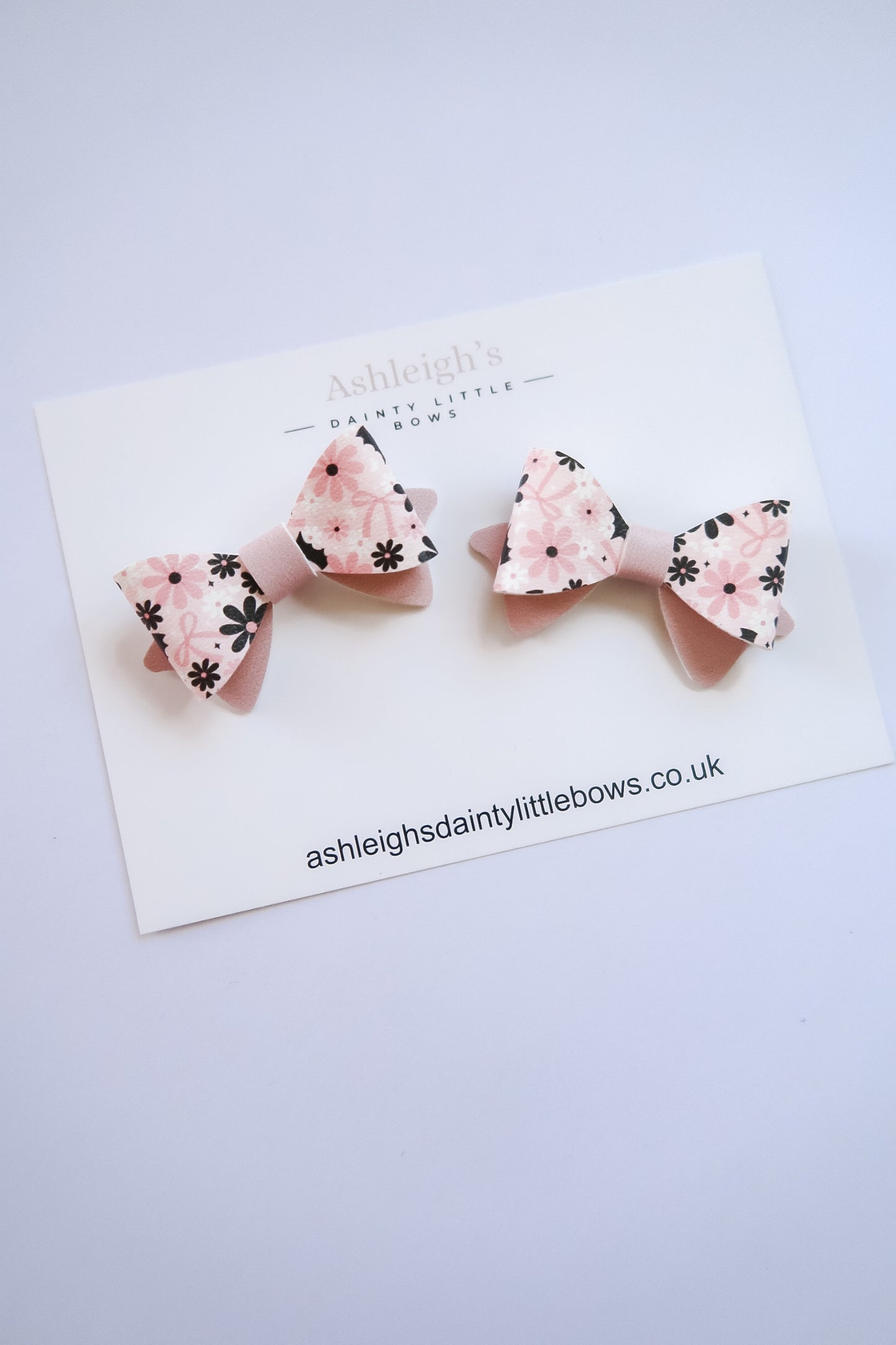 Pink bat penny bow