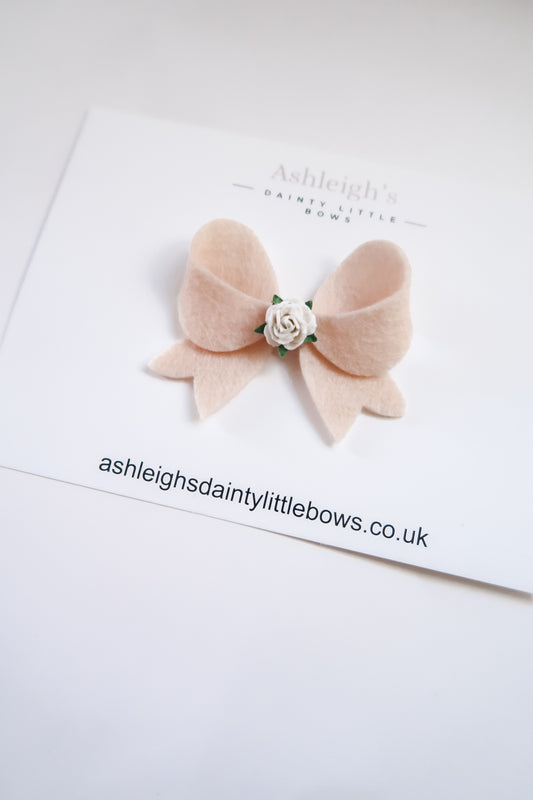 Soft peach flutter bow