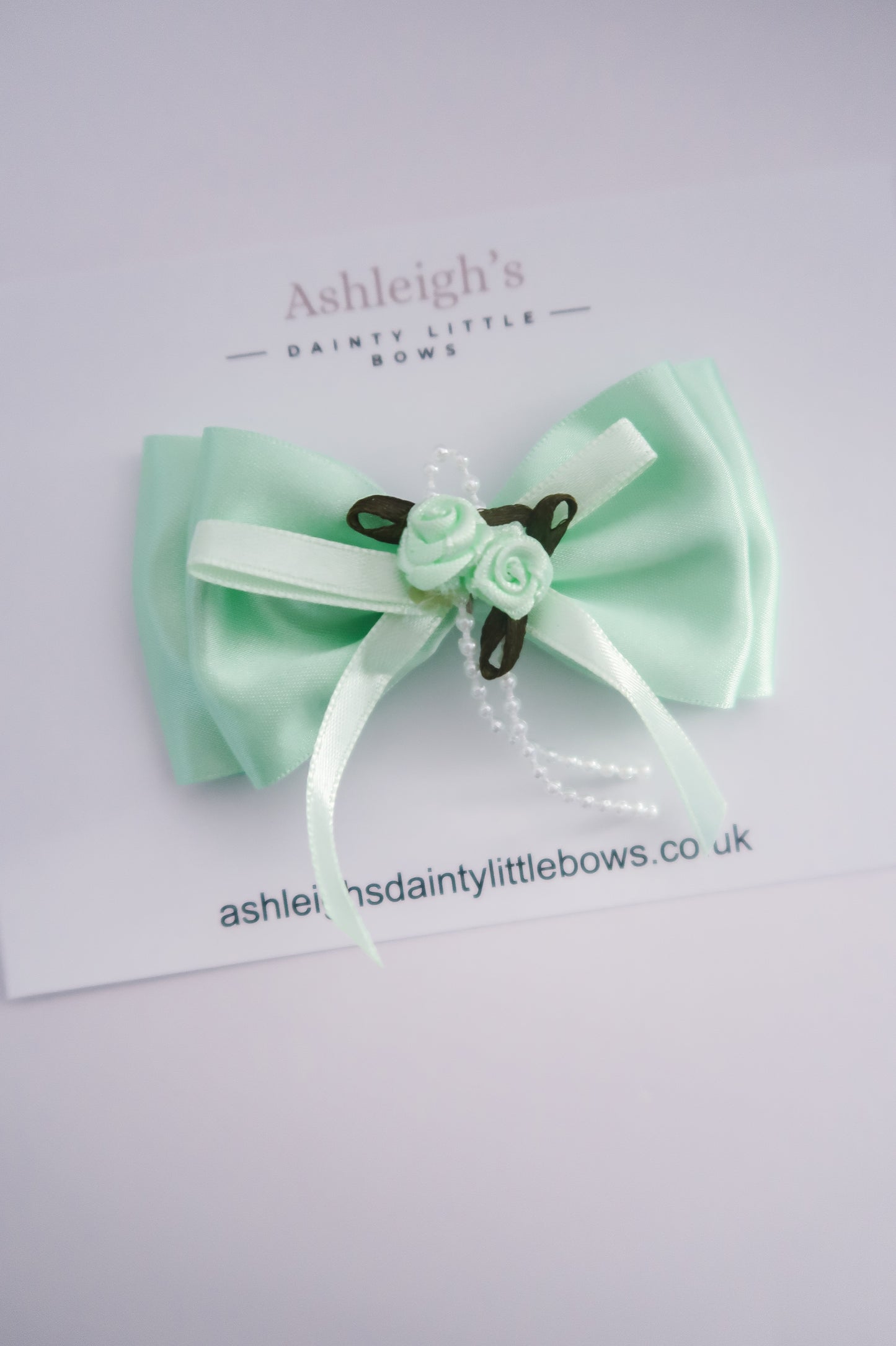 Mint rose bud bow