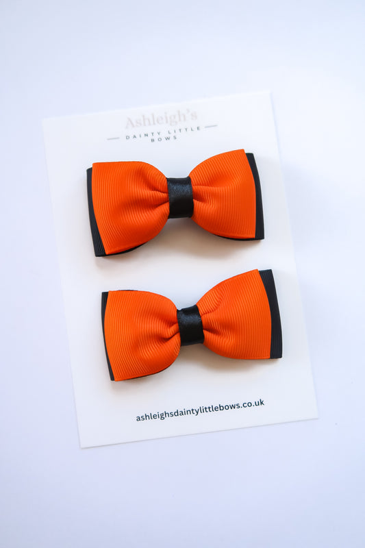 Orange pinch bow