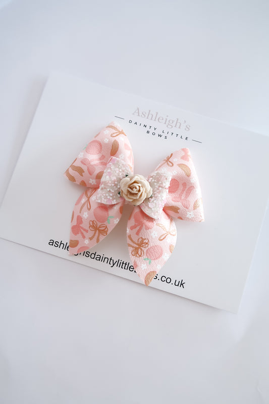 Bows and peaches pinch