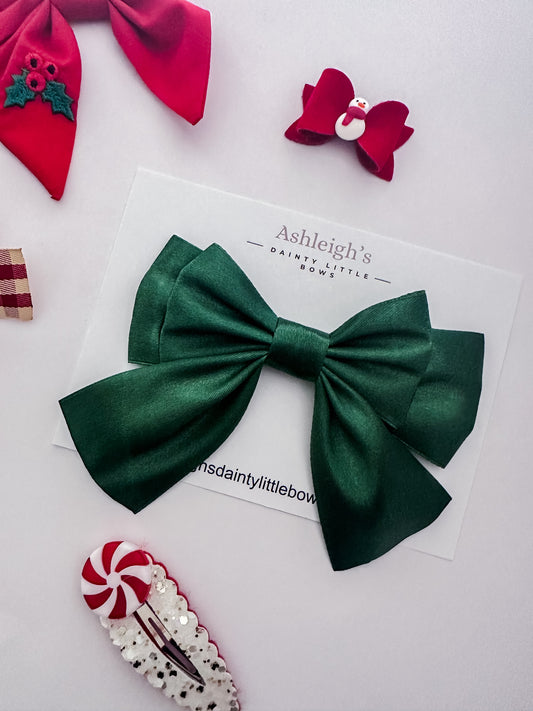 Large emerald green bow