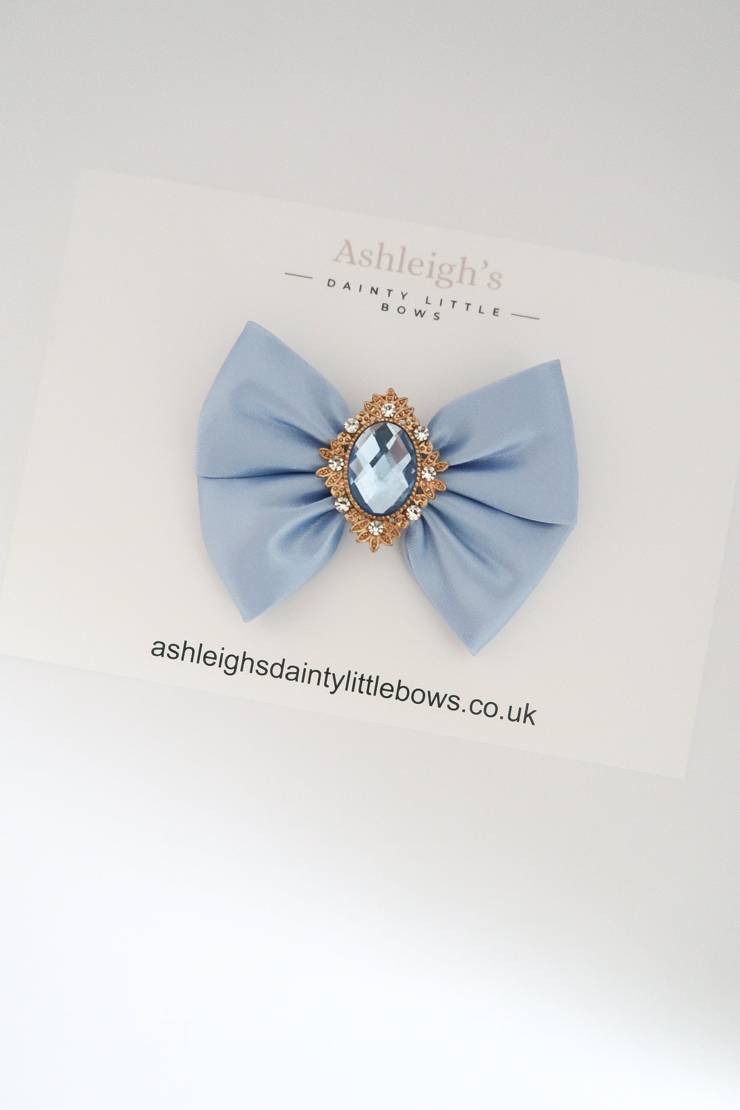 Light blue gem bow