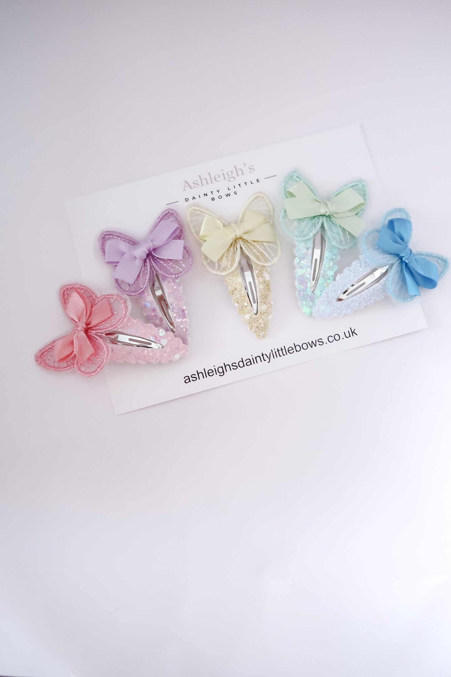 Butterfly snap clip