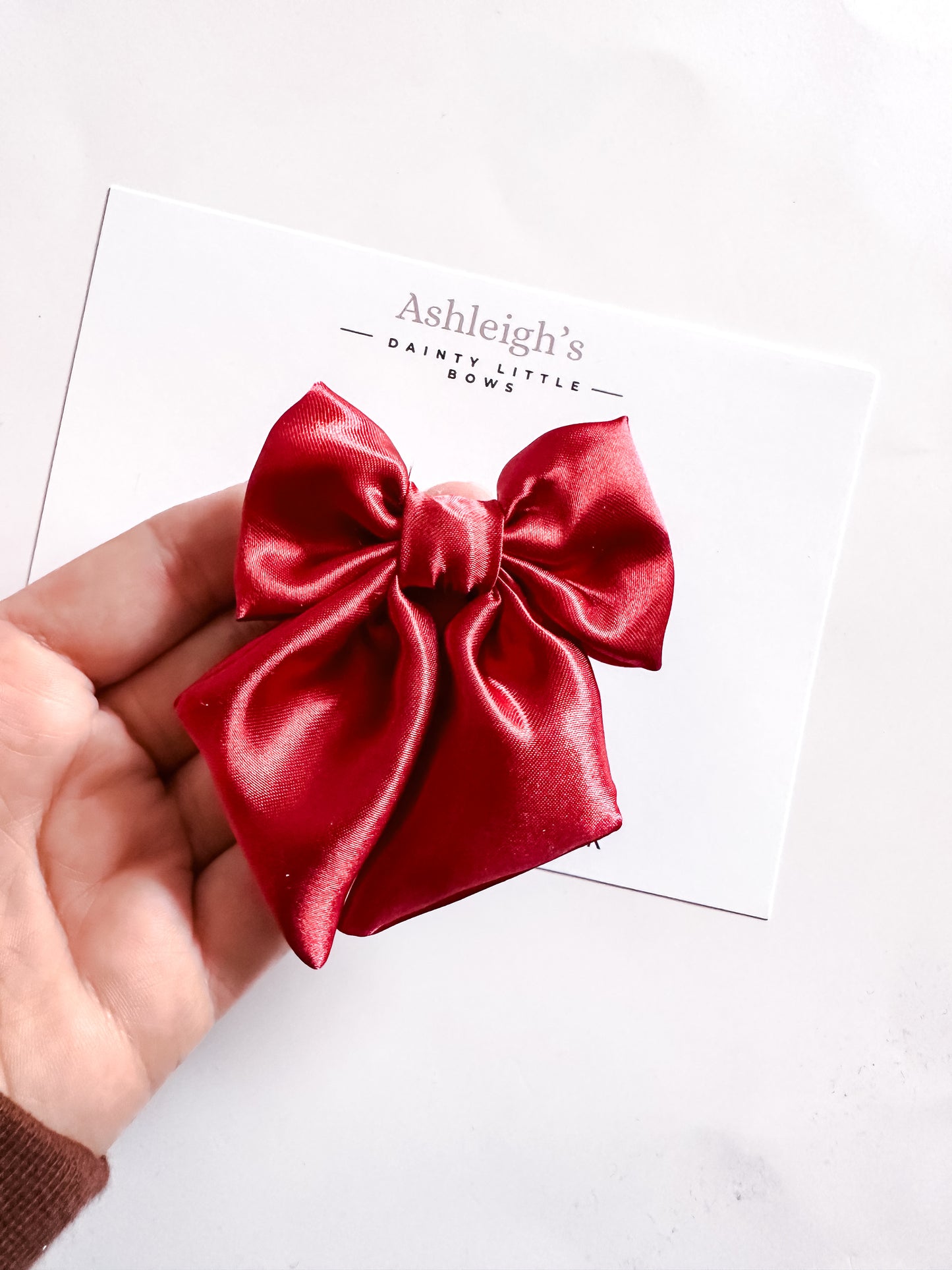 Red satin sailor bow