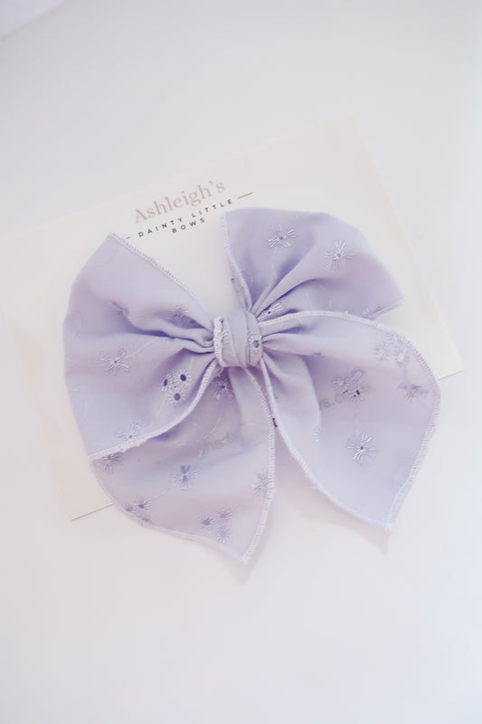 Oversized lilac brodiere fable bow
