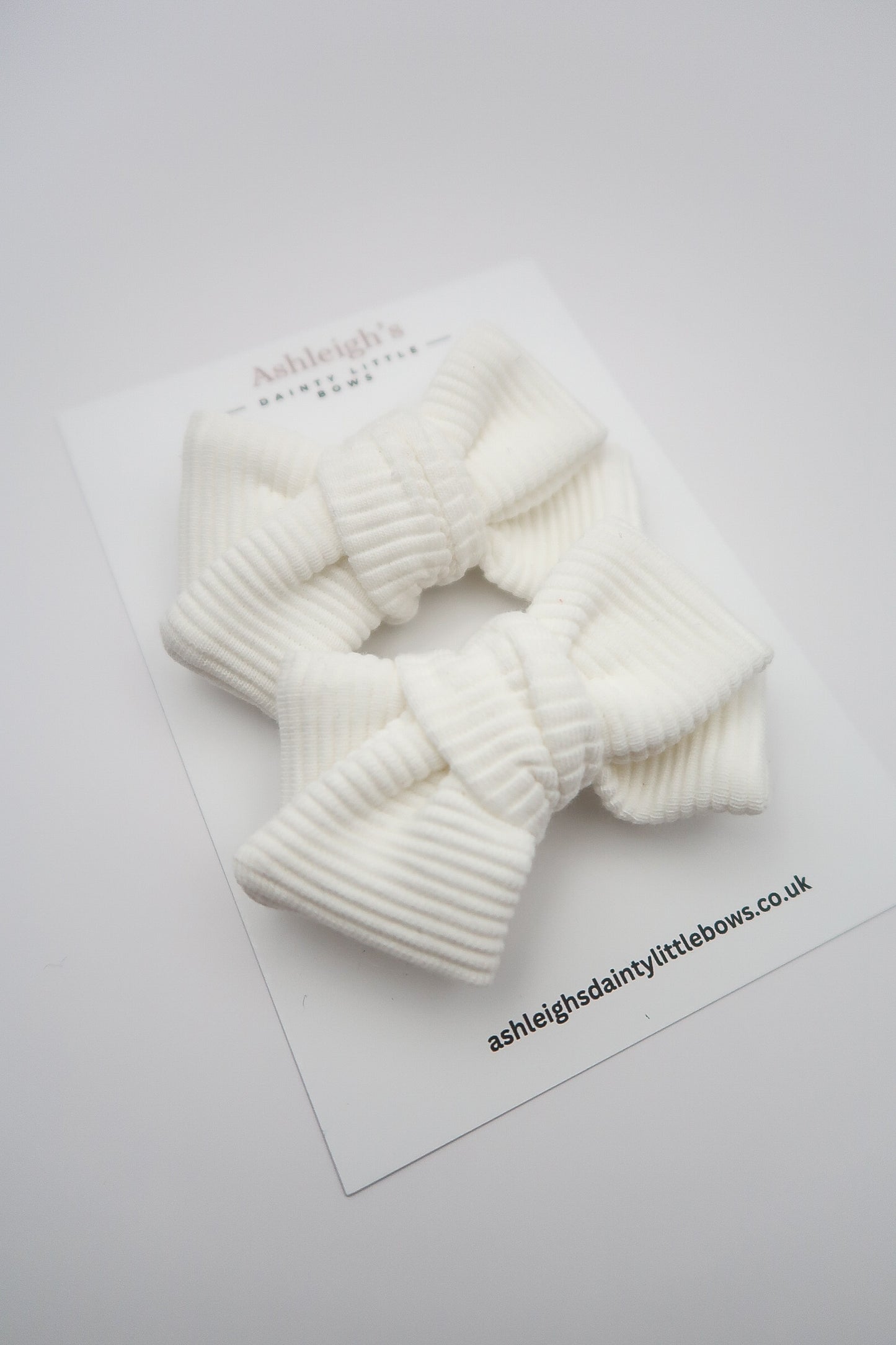 White ribbed handtied bow