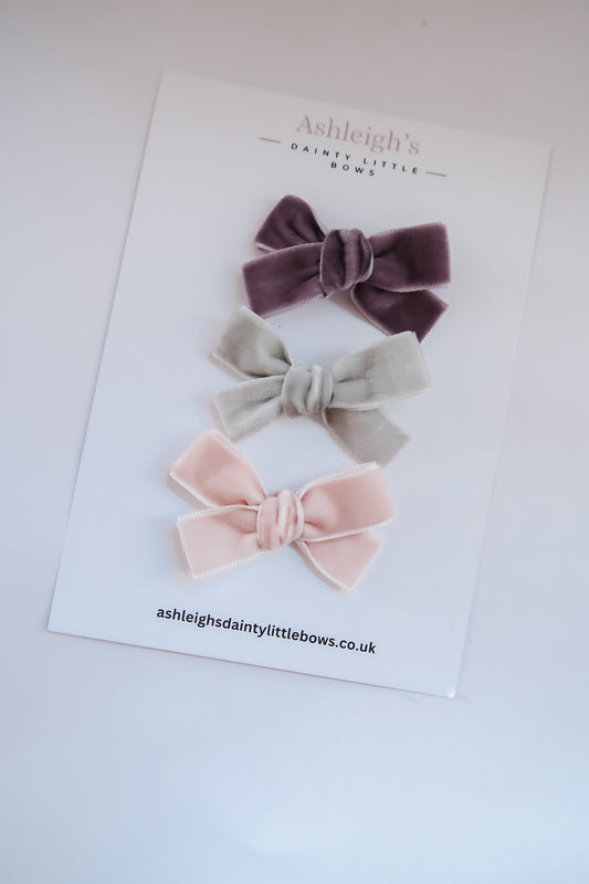 Dainty velvet tied bows