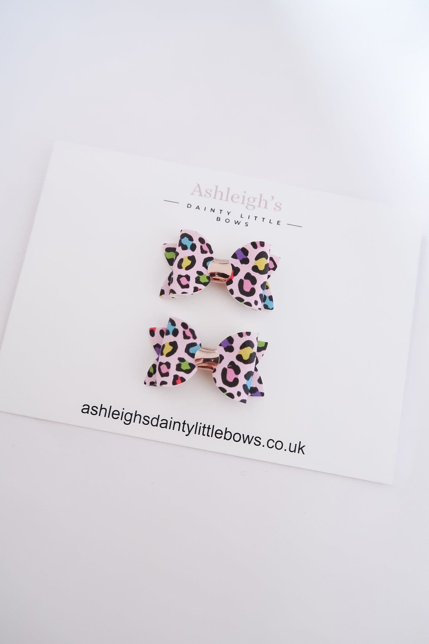 Bright leopard baby bow