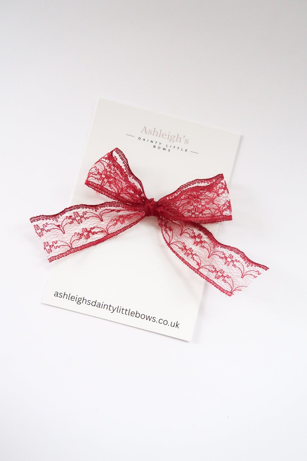 Red dainty lace bow