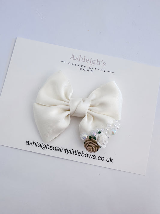 Ivory pearl cluster bow
