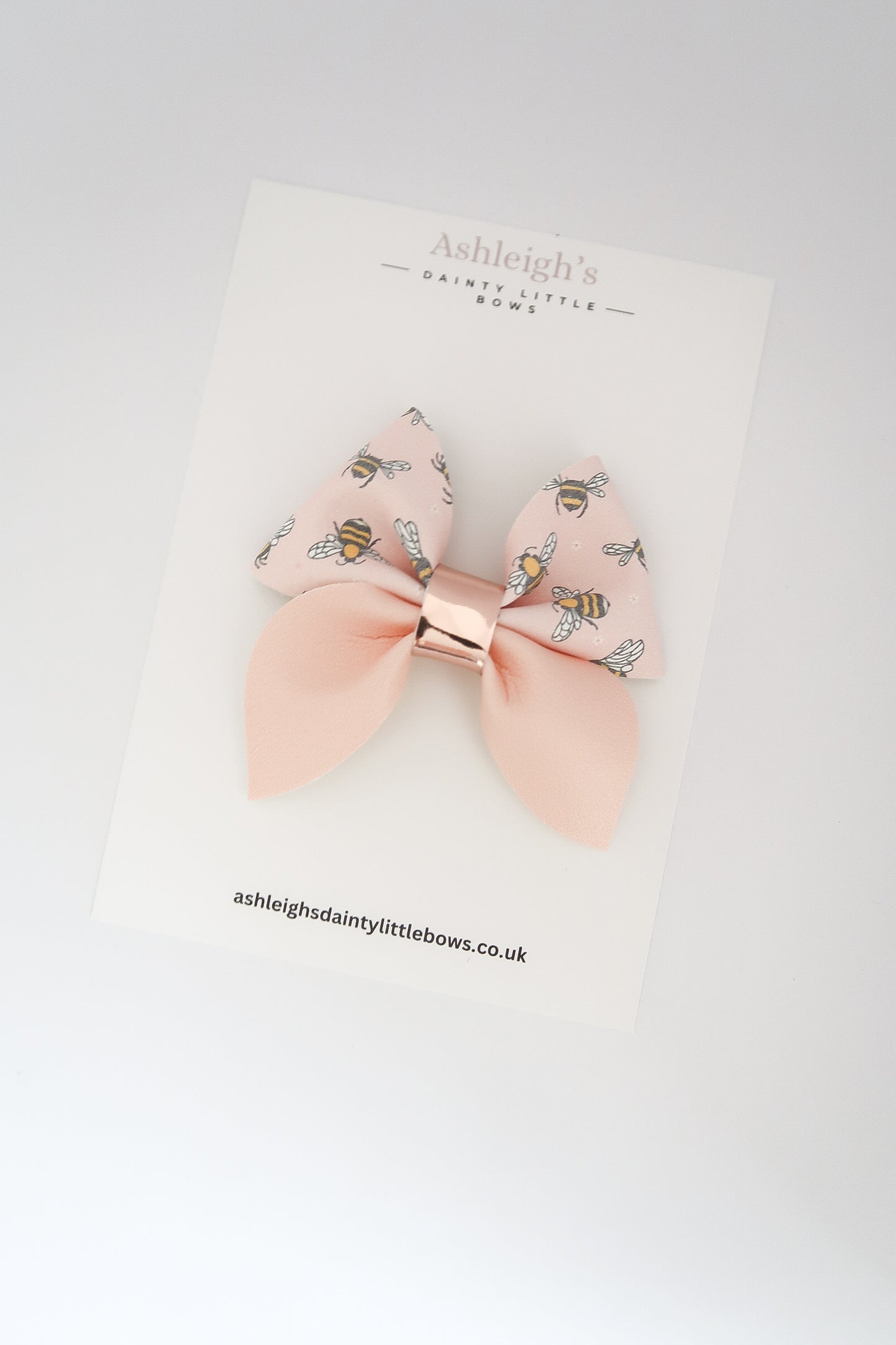 Pink bee pinch bow