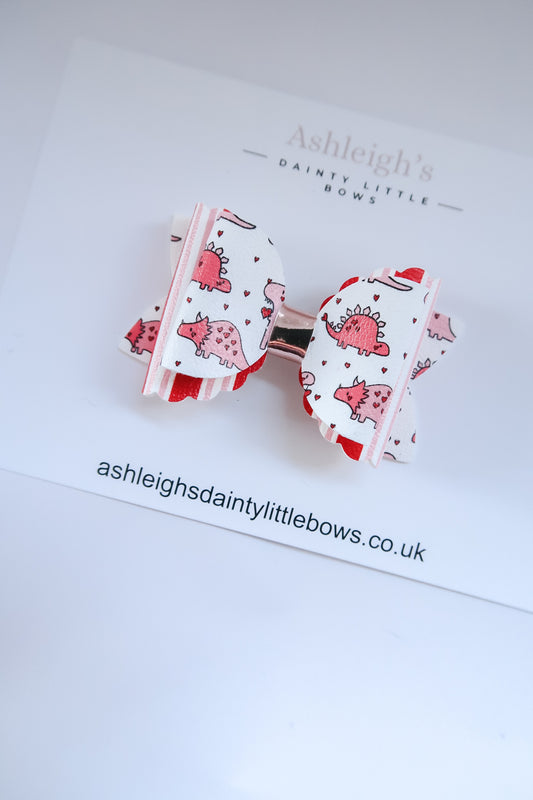 Scalloped bow dinos love