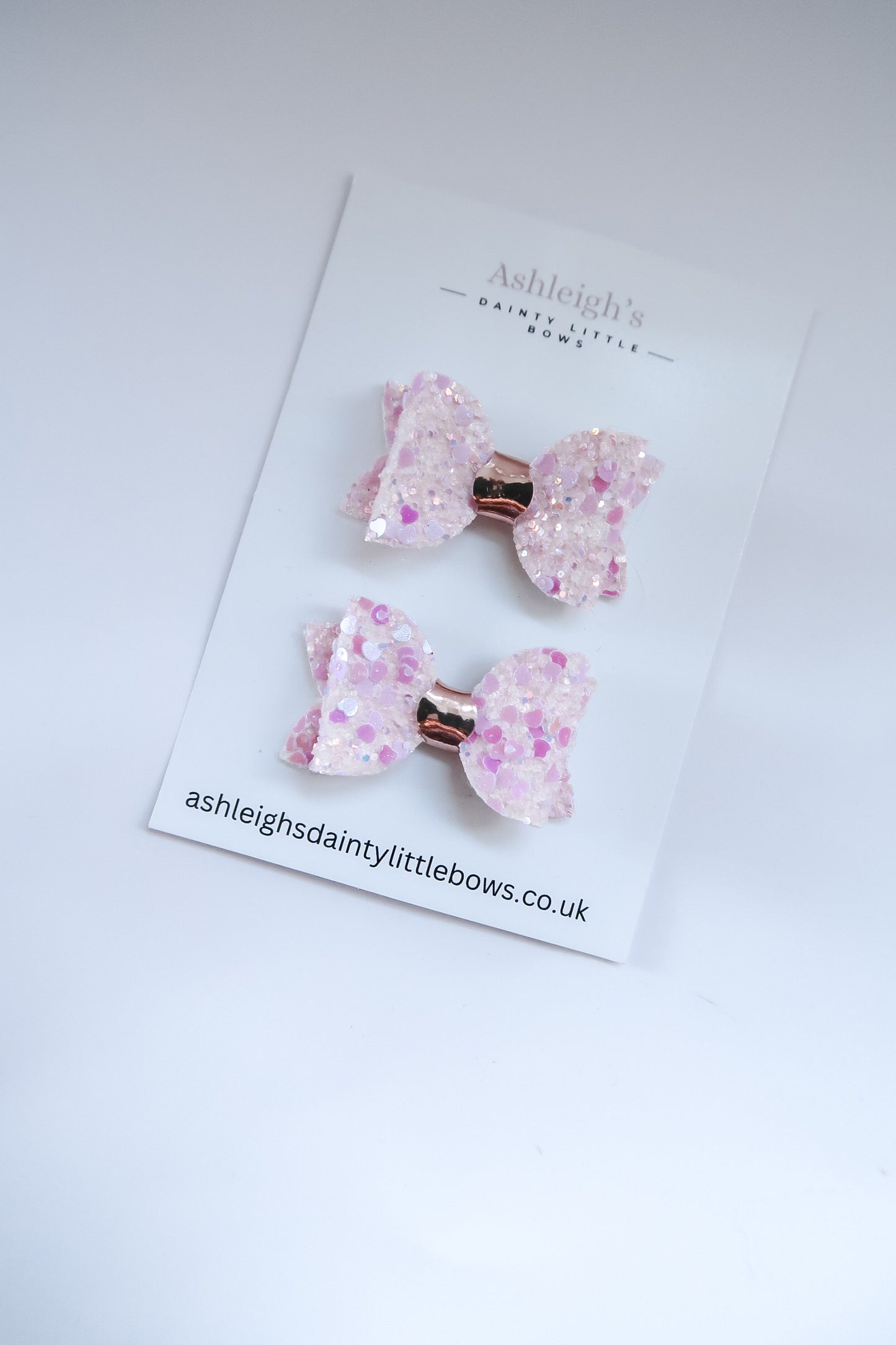 Pink sparkles baby bow