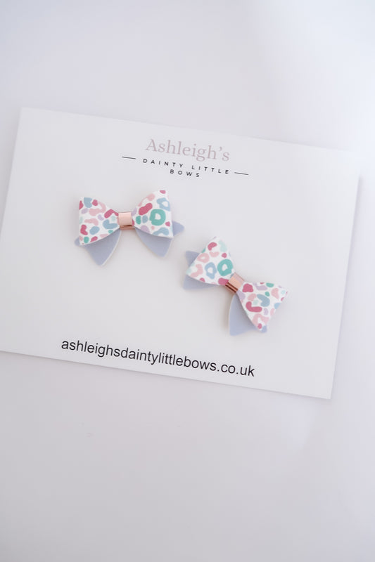 Dainty penny leopard bow