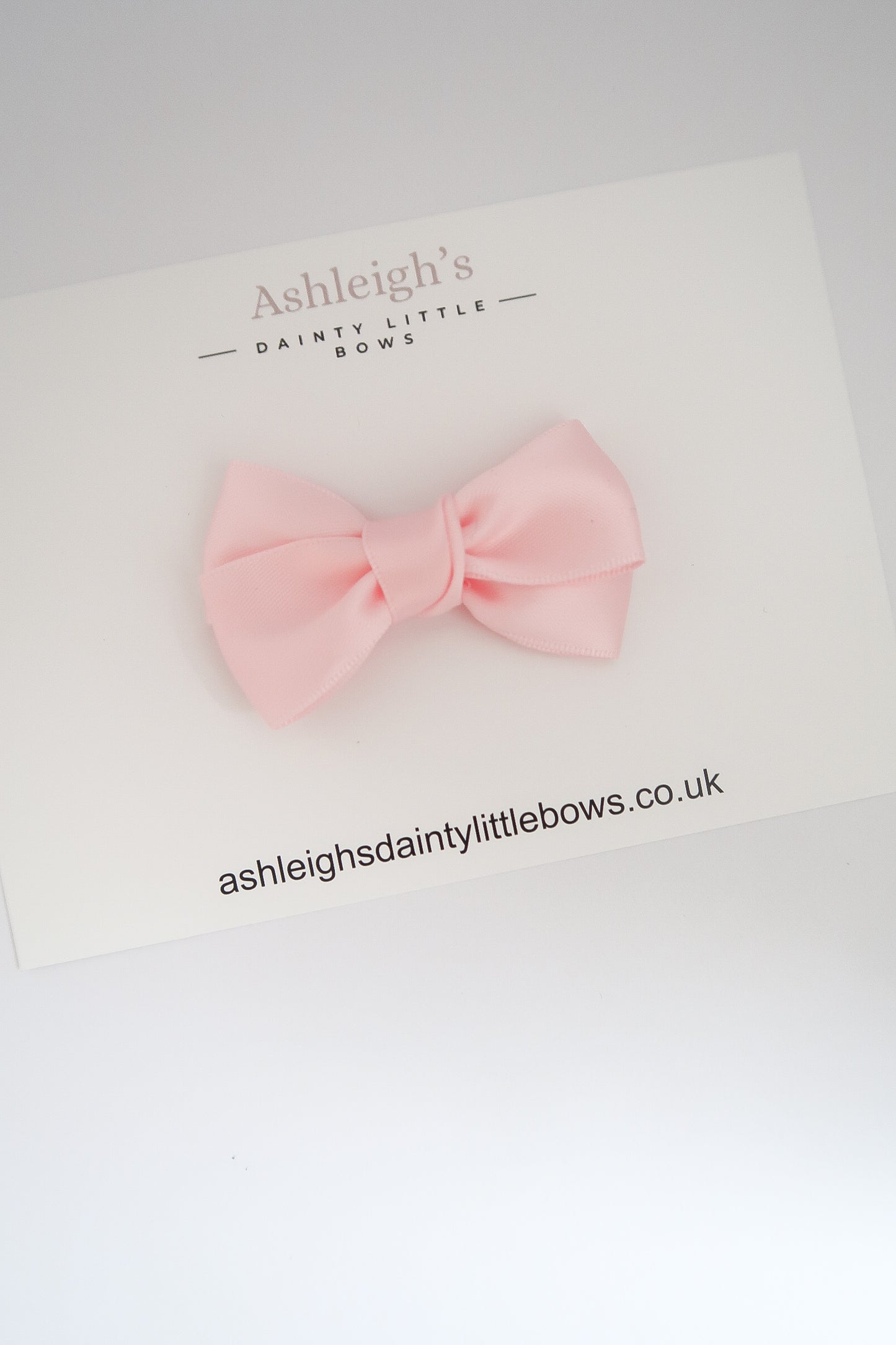 Pretty pink ribbon bow