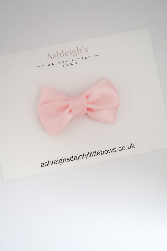 Pretty pink ribbon bow