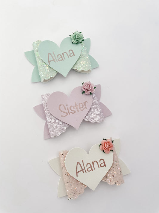 Personalised heart bows