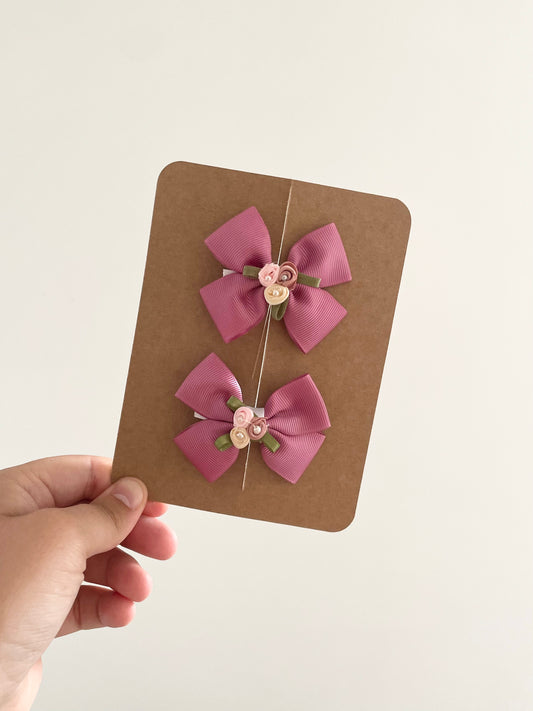 Dusky pink ribbon bows