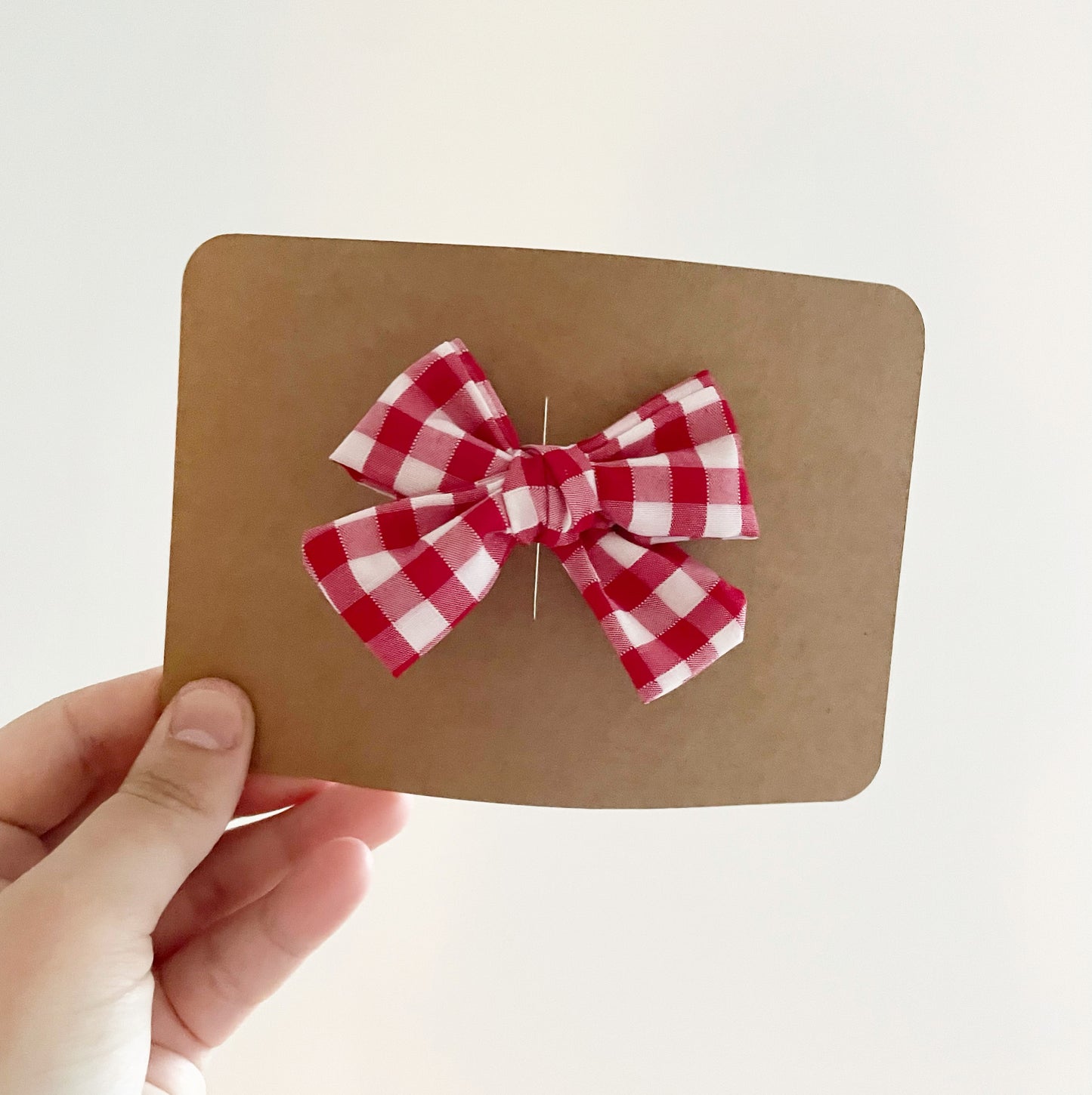 Red gingham hand tied bow